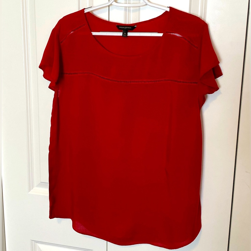 Banana Republic red blouse with open-stitched decor